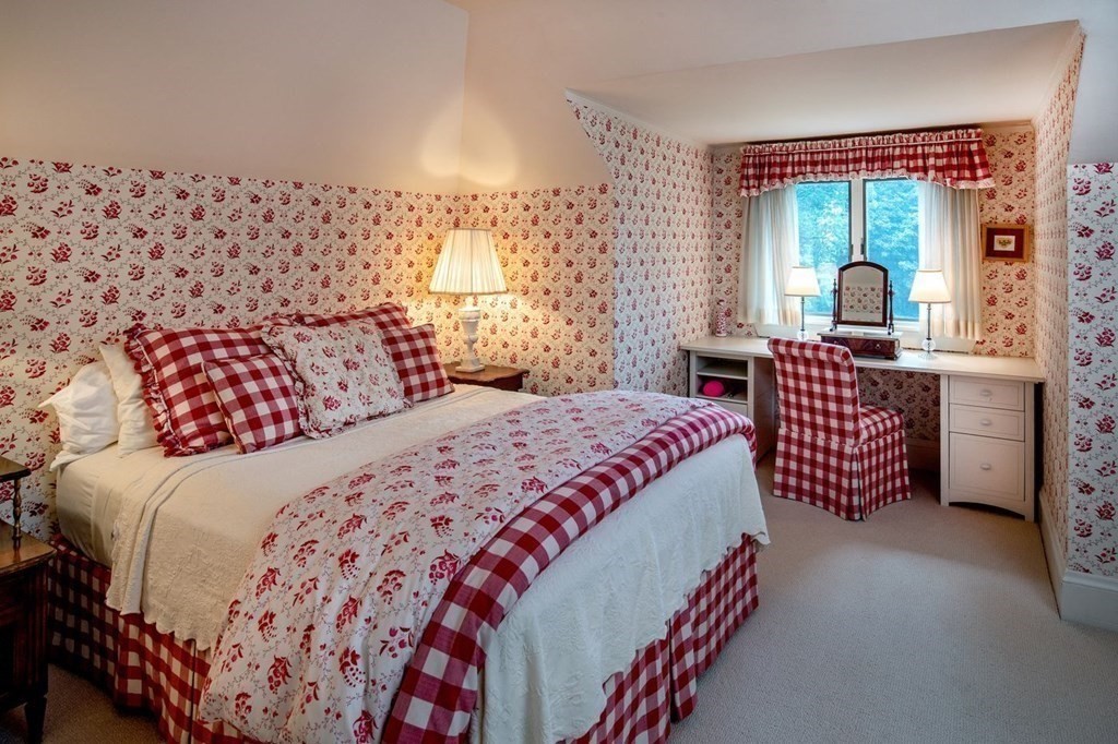 85 Dudley Road Newton, MA 02459 - Photo 17 of 32 a bedroom with a bed and a painting on the wall