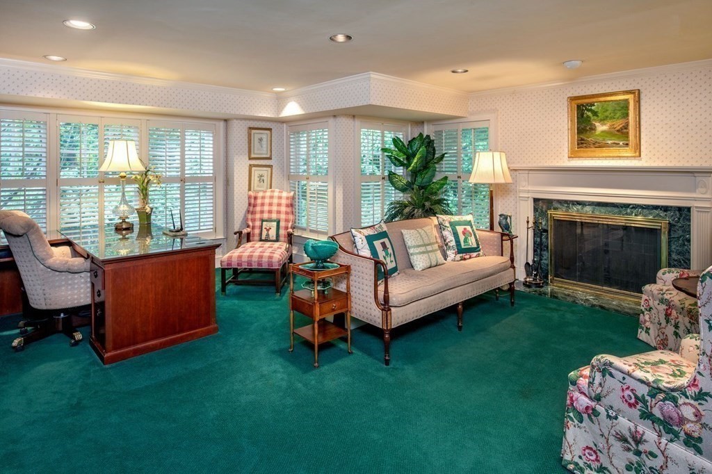 85 Dudley Road Newton, MA 02459 - Photo 20 of 32 a living room with furniture and a fireplace