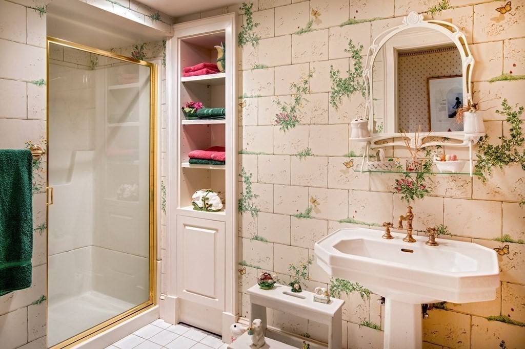 85 Dudley Road Newton, MA 02459 - Photo 21 of 32 a bathroom with a sink and a shower