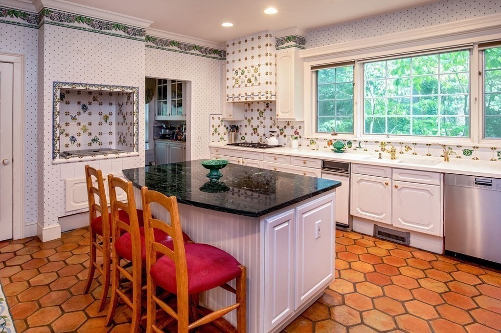 85 Dudley Road Newton, MA 02459 - Photo 5 of 32 a kitchen with stainless steel appliances granite countertop a sink and a stove