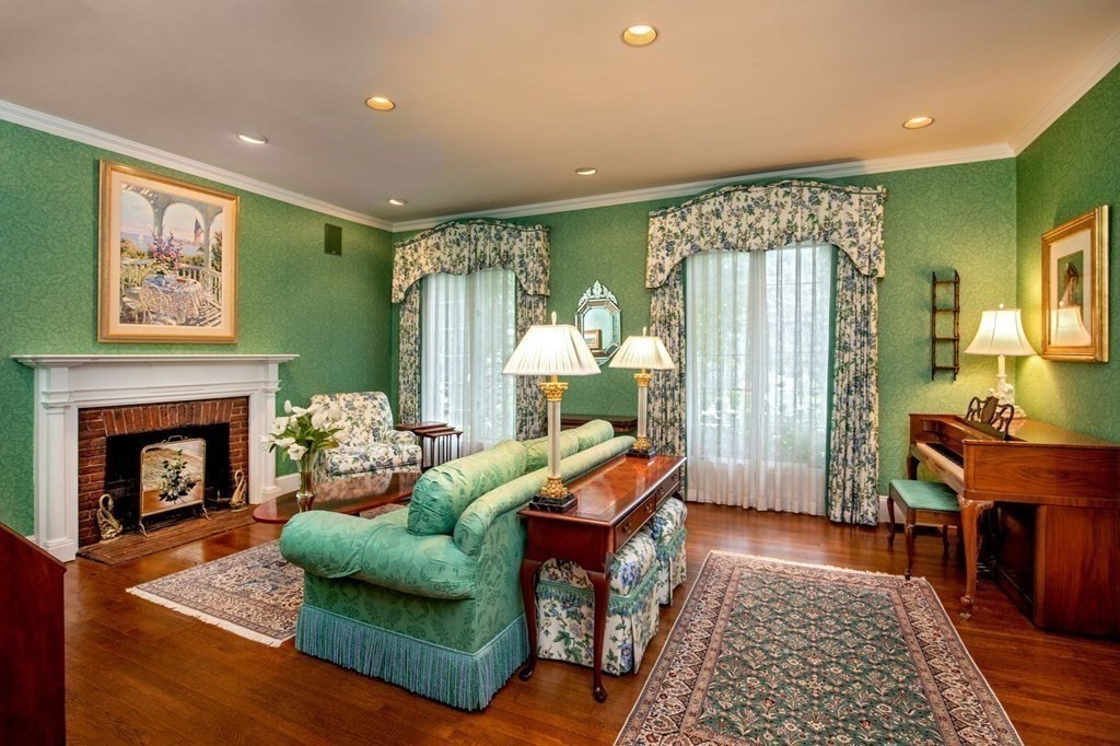 85 Dudley Road Newton, MA 02459 - Photo 8 of 32 a living room with furniture and a fireplace