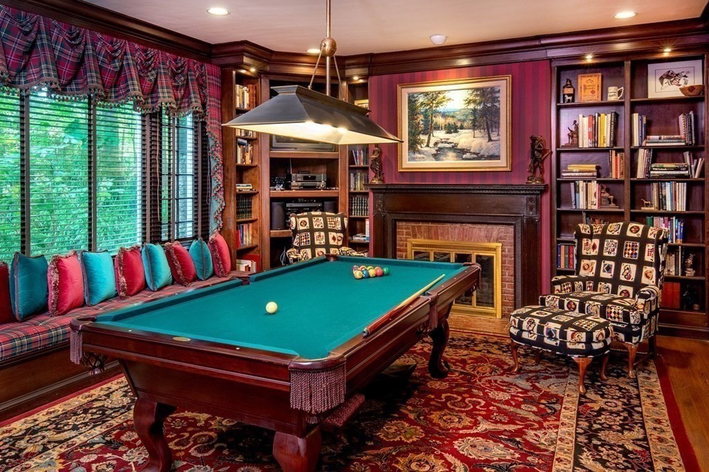 85 Dudley Road Newton, MA 02459 - Photo 9 of 32 a room with furniture and a fireplace