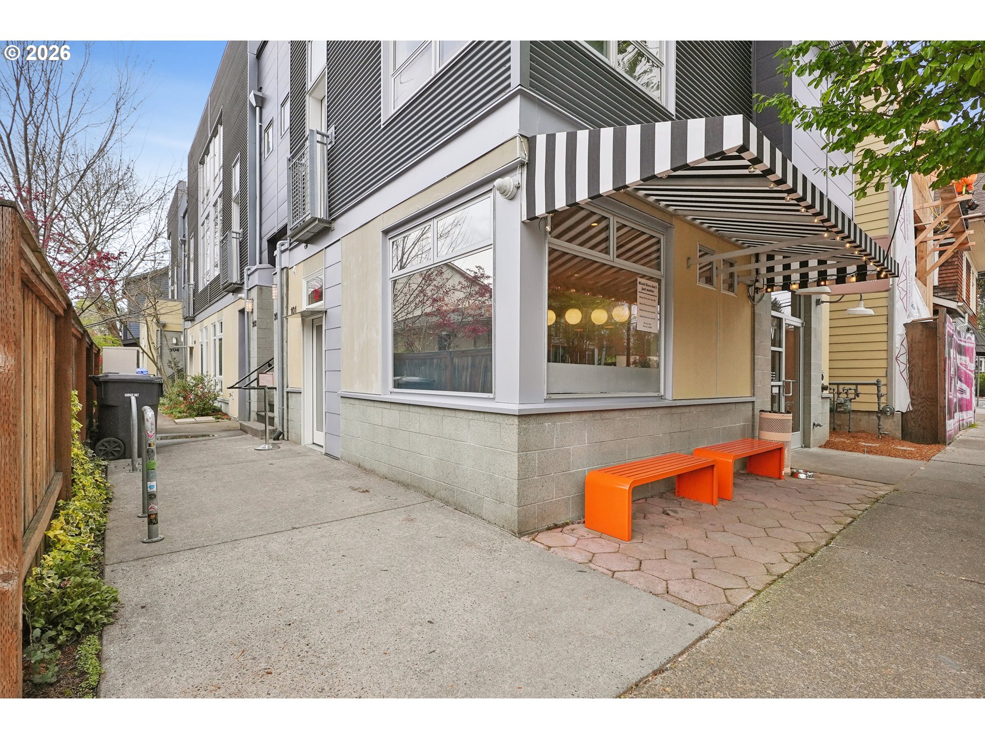 2021 Southeast Clinton Street, Unit 201 Portland, OR 97202 - Photo 2 of 35 a view of a house with large windows