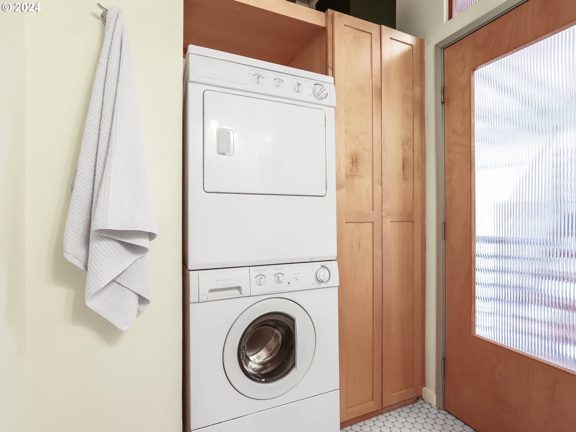 2021 Southeast Clinton Street, Unit 201 Portland, OR 97202 - Photo 25 of 35 a utility room with dryer and washer