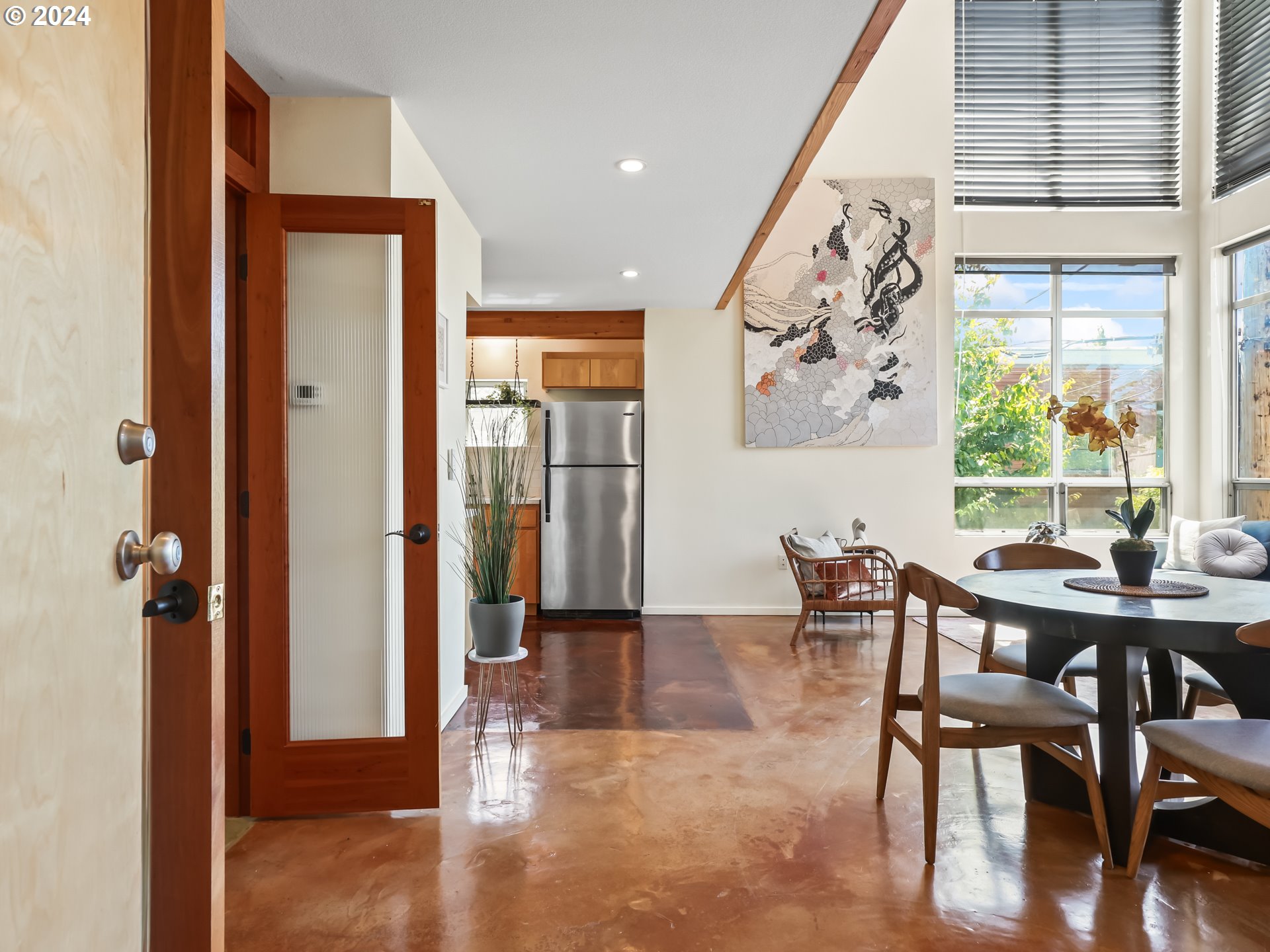 2021 Southeast Clinton Street, Unit 201 Portland, OR 97202 - Photo 3 of 35 a view of a dining room with furniture and window