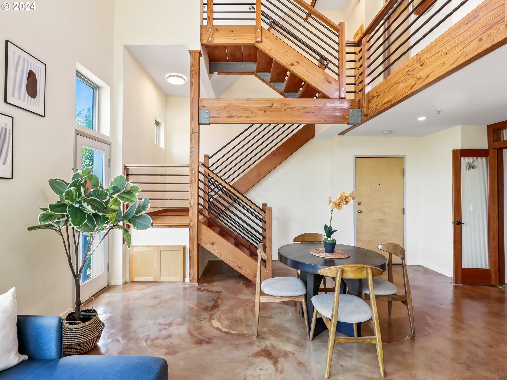 2021 Southeast Clinton Street, Unit 201 Portland, OR 97202 - Photo 8 of 35 a dining room with furniture and wooden floor