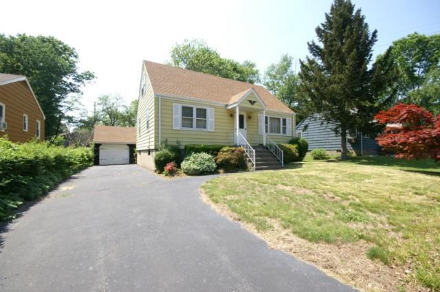 130 Forestview Road Bridgeport, CT 06606 - Photo 1 of 1 a front view of a house with garden