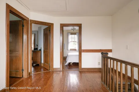 a view of entryway with wooden floor