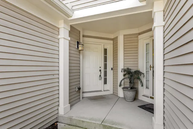 a view of staircase with white walls