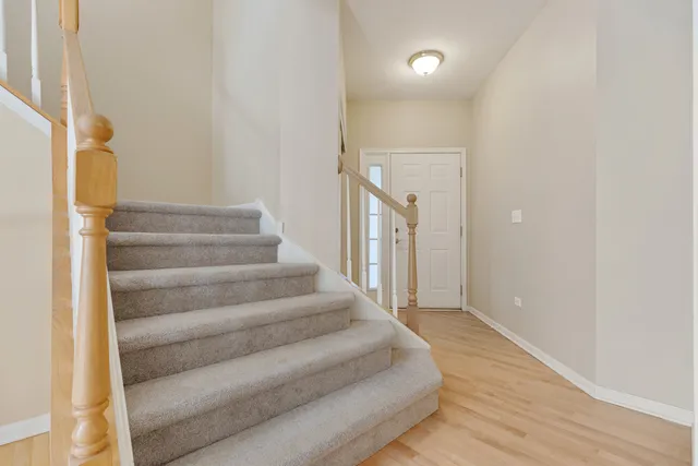 a view of an empty room with windows