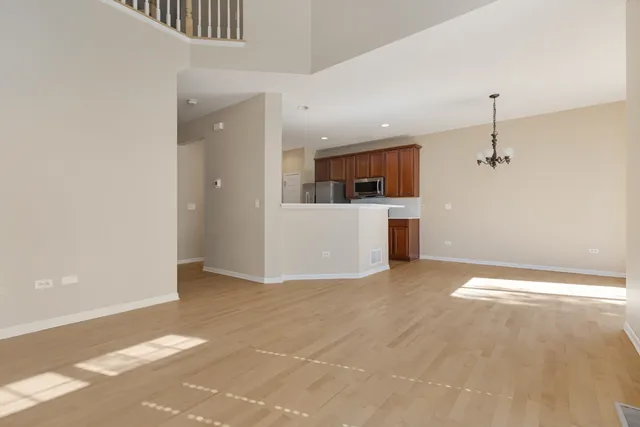 a view of a room with a large window