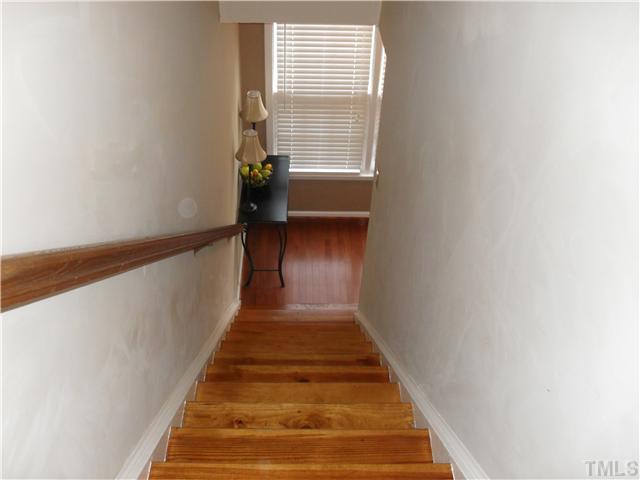 126 Timber Ridge Drive Durham, NC 27713 - Photo 10 of 16 Hardwoods on the stairs are new as well.