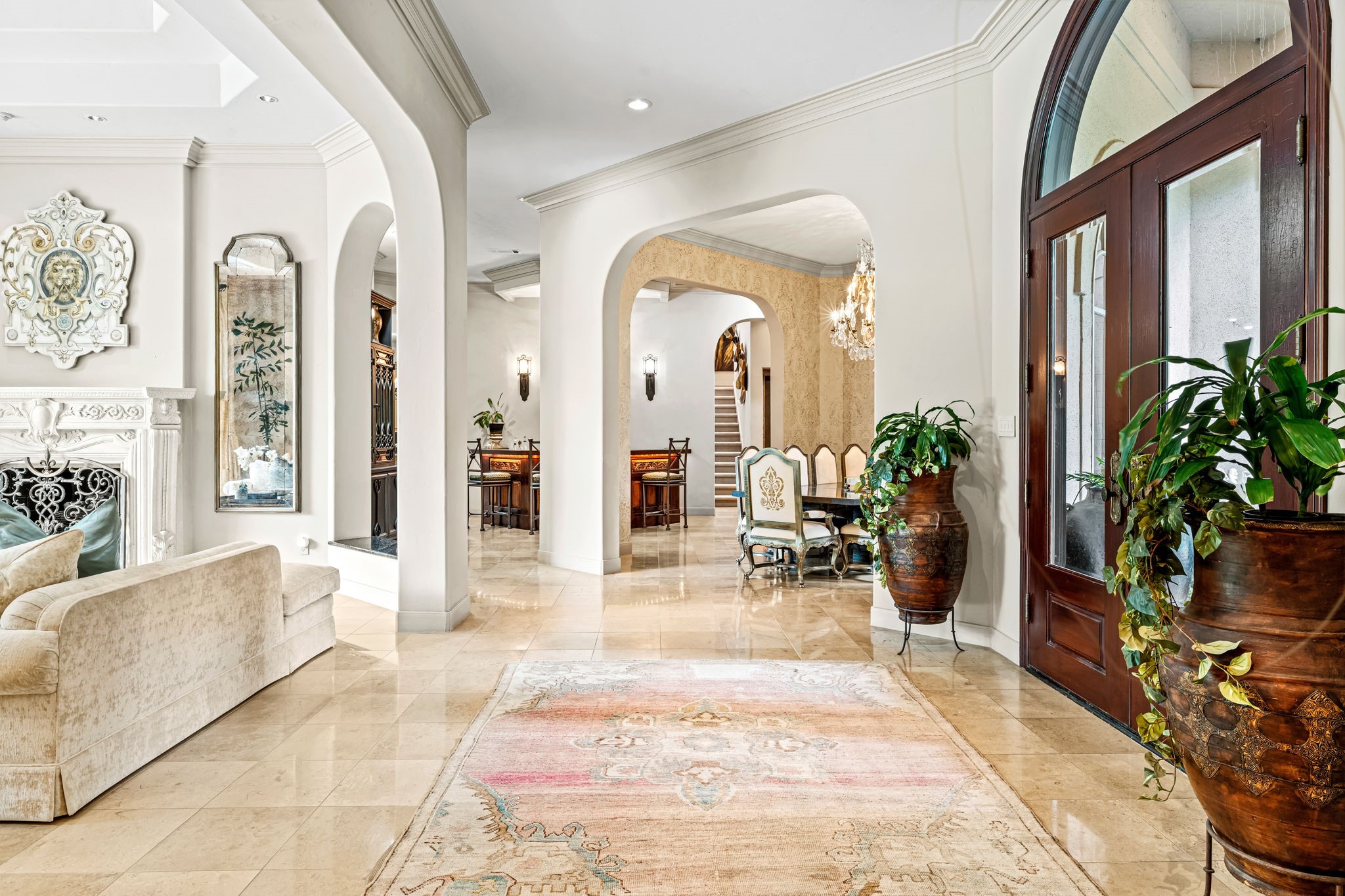 6 Mott Lane Houston, TX 77024 - Photo 24 of 50 Grand interior spaces defined by soaring ceilings, graceful archways, and elegant finishes throughout.