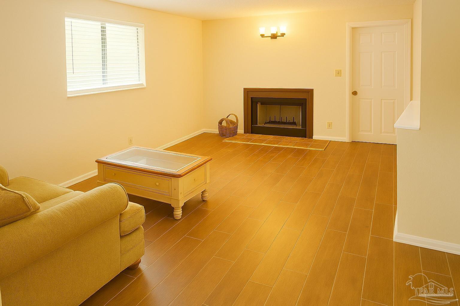 6274 Munson Highway Milton, FL 32570 - Photo 11 of 26 a room with table and a window