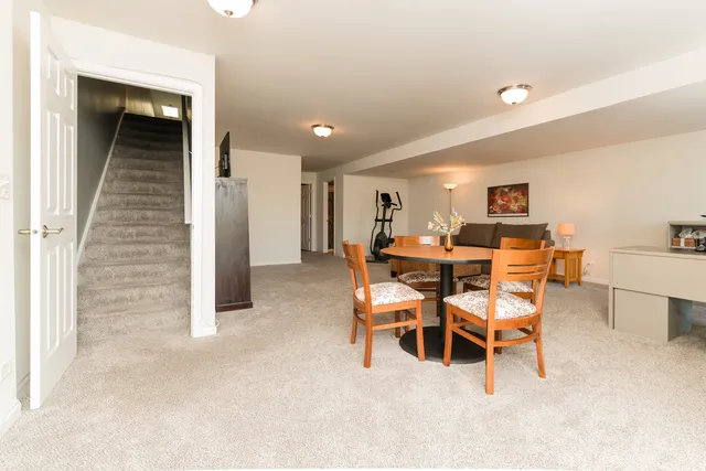 a view of a livingroom with furniture and window
