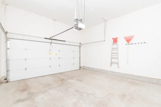 a view of a room with white walls