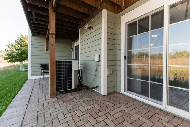 a view of front door and bedroom