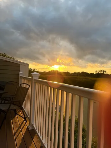 a view of balcony with ocean view