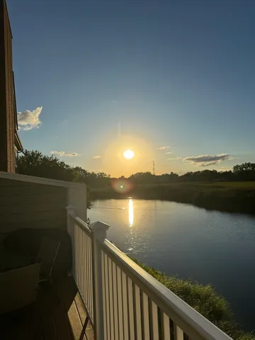 a view of a lake from a balcony