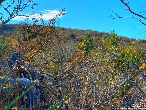 a view of a house with a street
