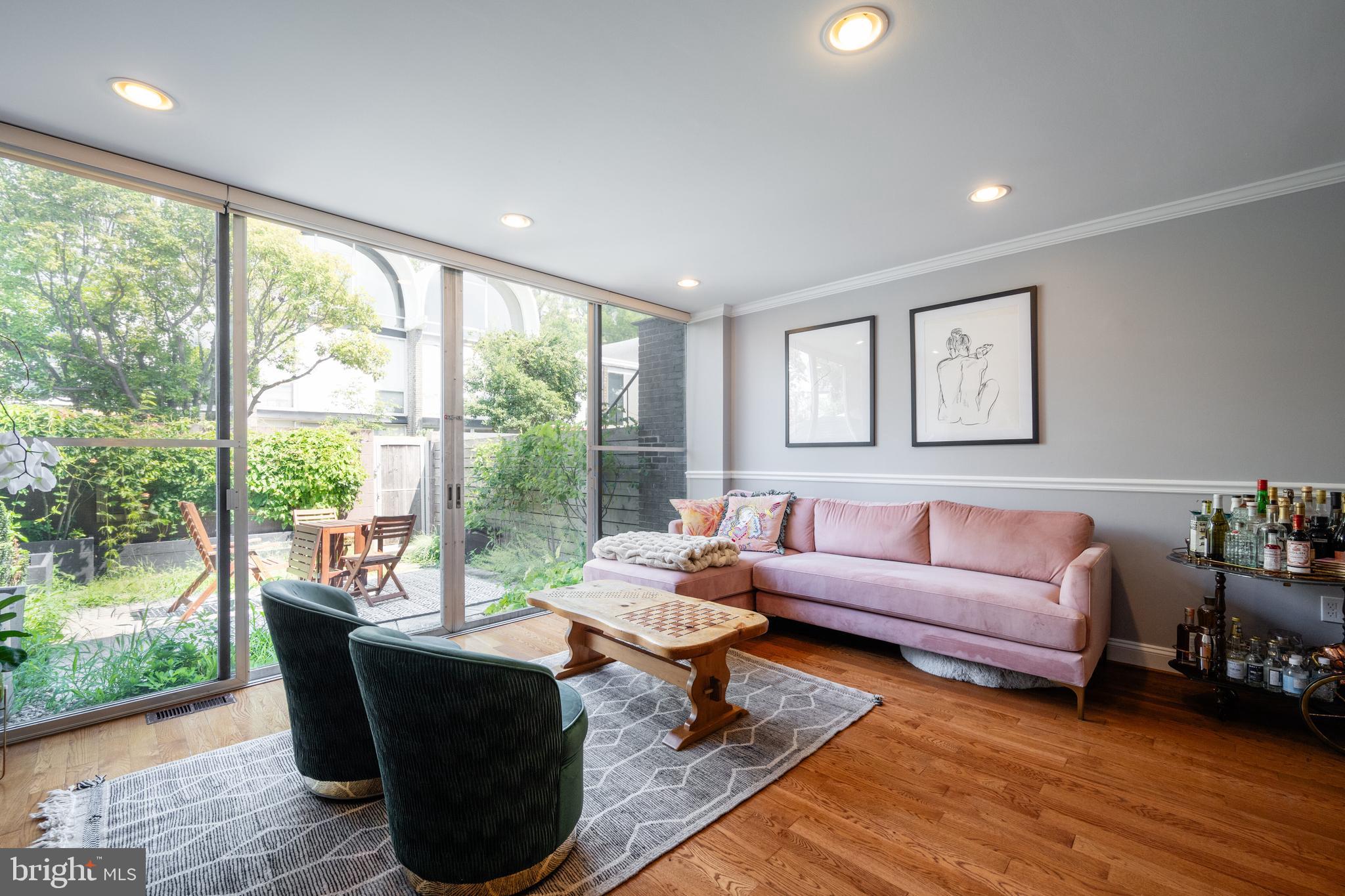 352 N Street Southwest Washington, DC 20024 - Photo 1 of 57 a living room with furniture and a large window
