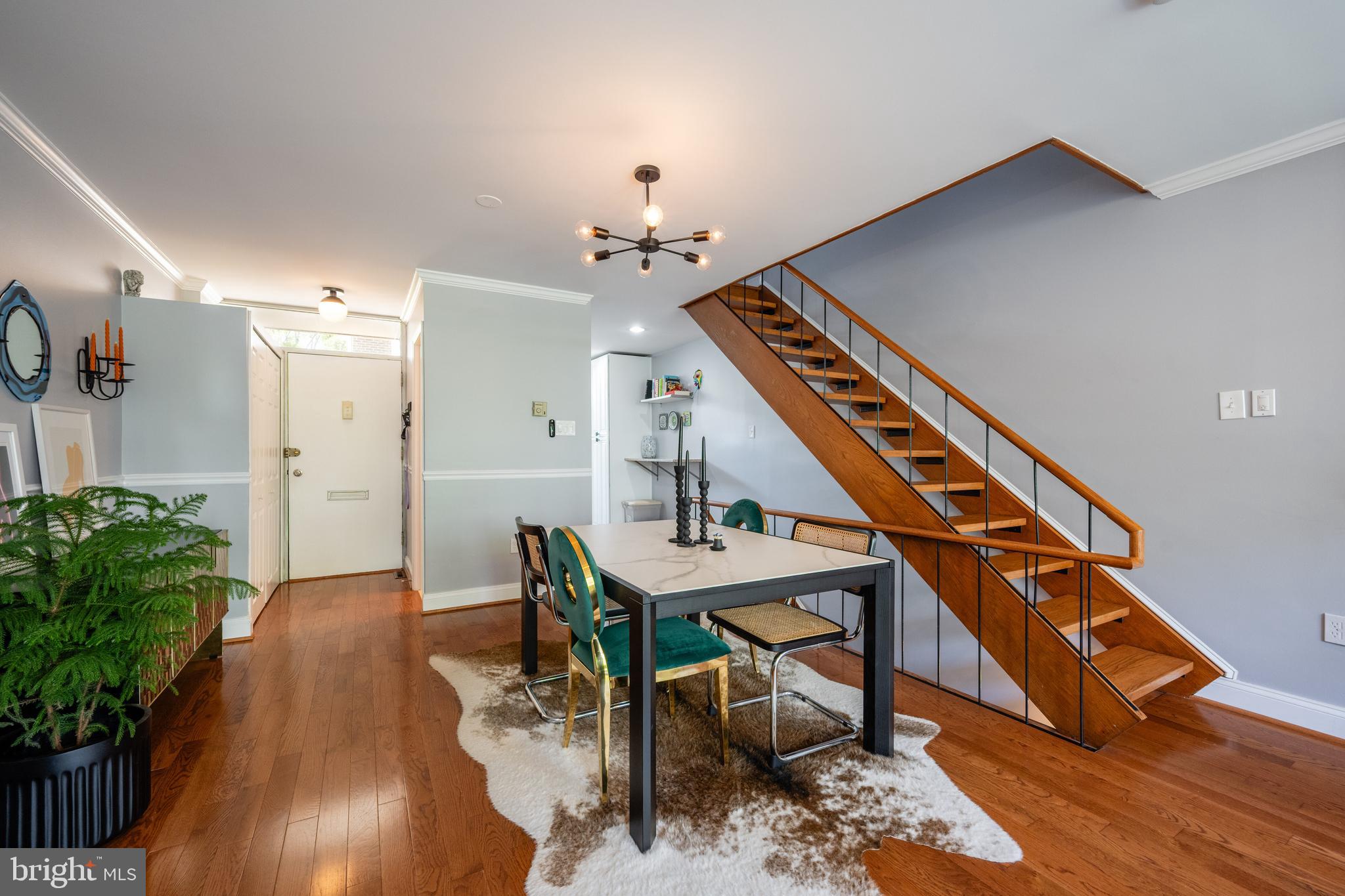 352 N Street Southwest Washington, DC 20024 - Photo 11 of 57 a room with furniture and wooden floor