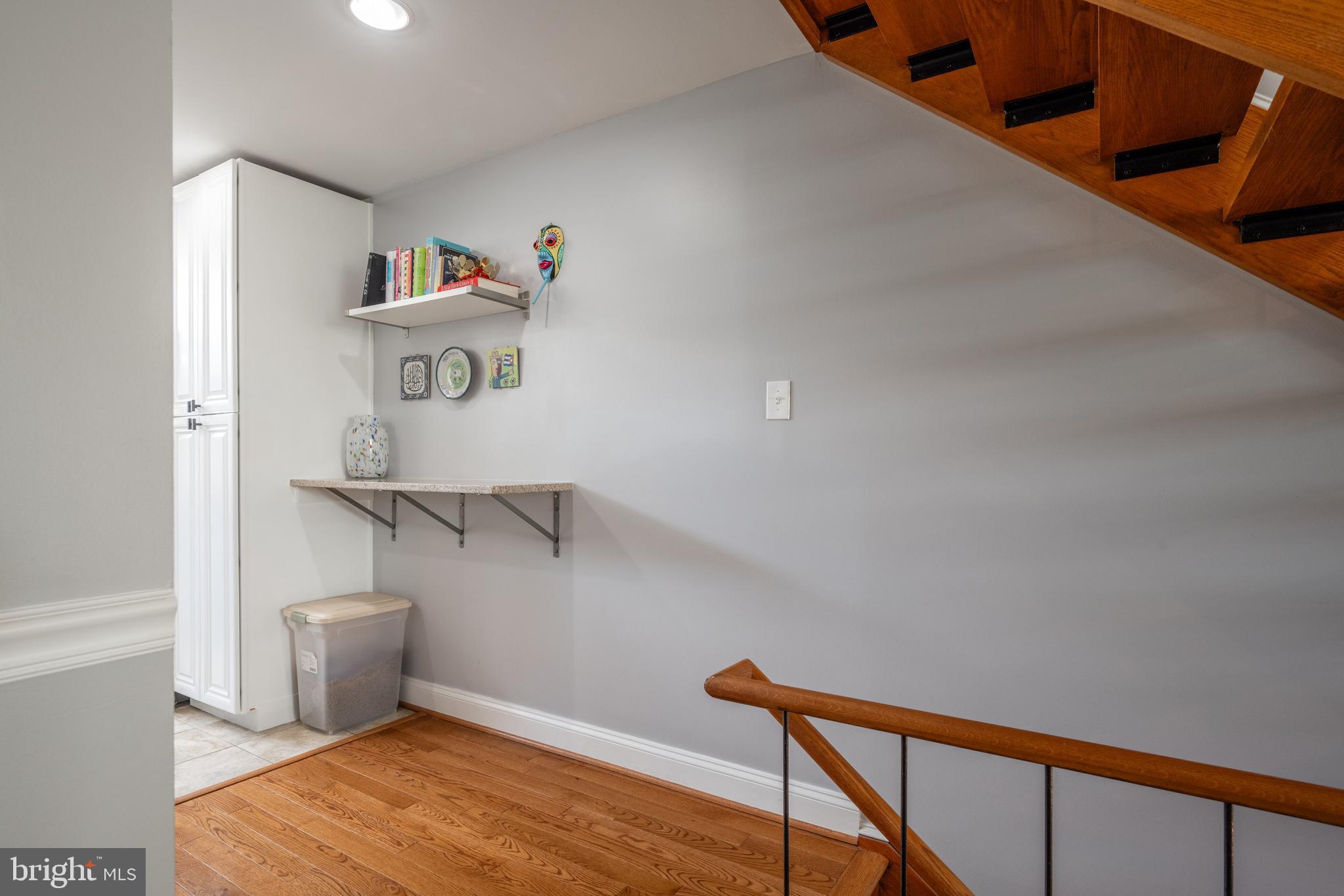 352 N Street Southwest Washington, DC 20024 - Photo 12 of 57 a view of a room with racks on the wall