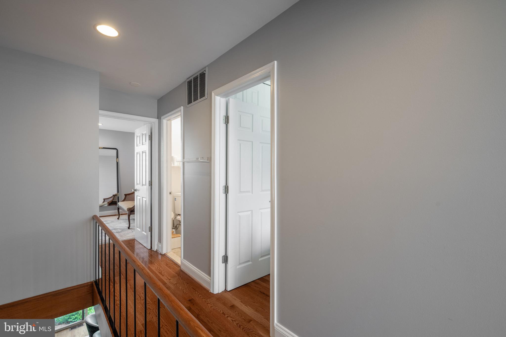 352 N Street Southwest Washington, DC 20024 - Photo 20 of 57 a view of a hallway with wooden floor and staircase