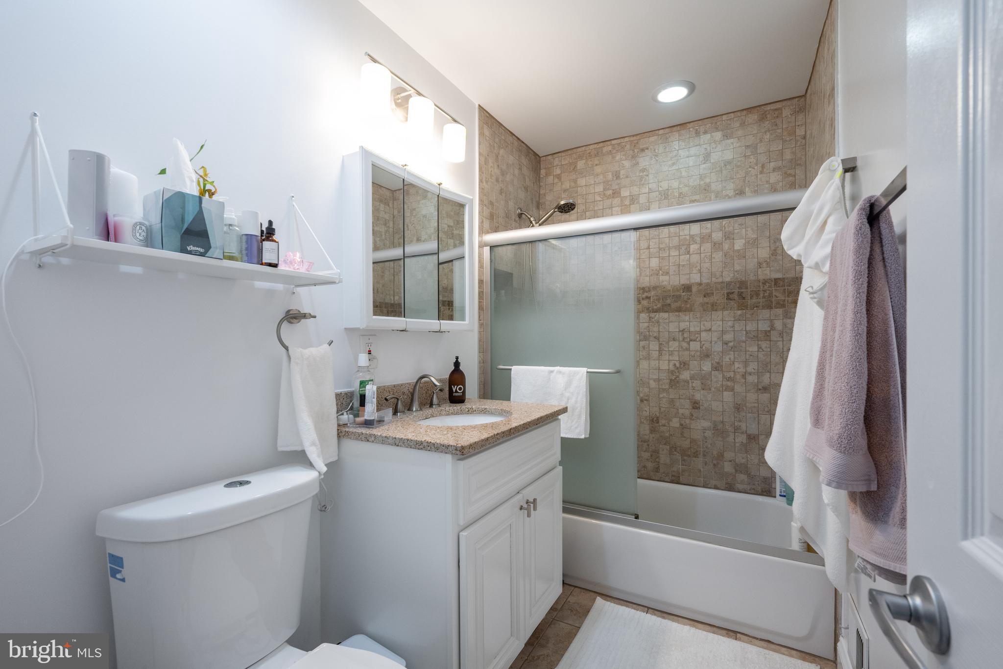 352 N Street Southwest Washington, DC 20024 - Photo 24 of 57 a bathroom with a sink toilet and shower