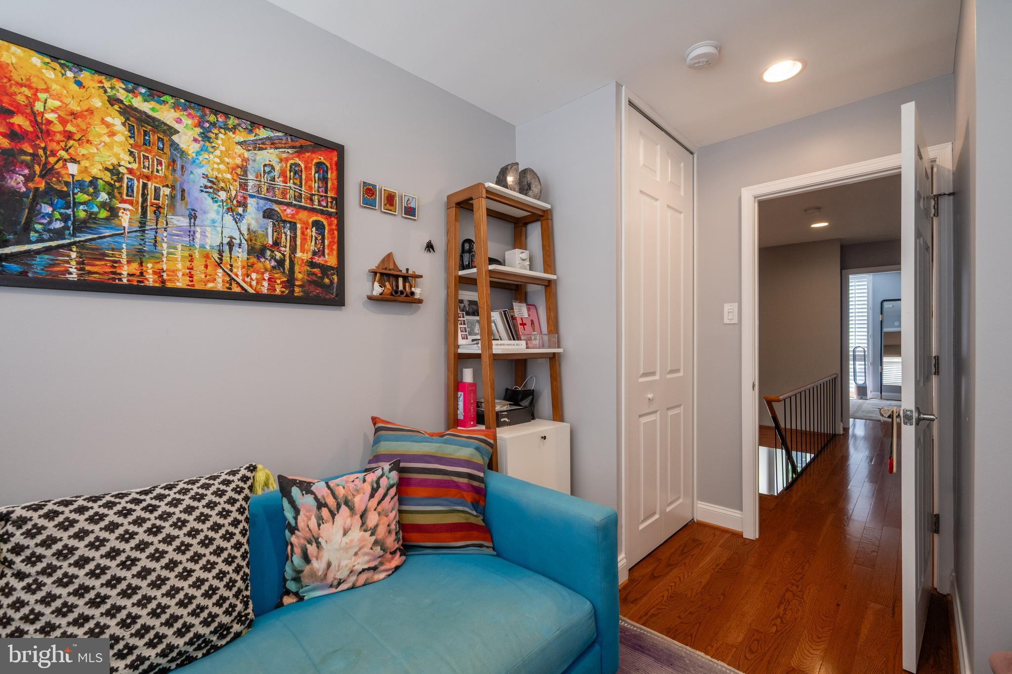 352 N Street Southwest Washington, DC 20024 - Photo 27 of 57 a bedroom with furniture and a book shelf