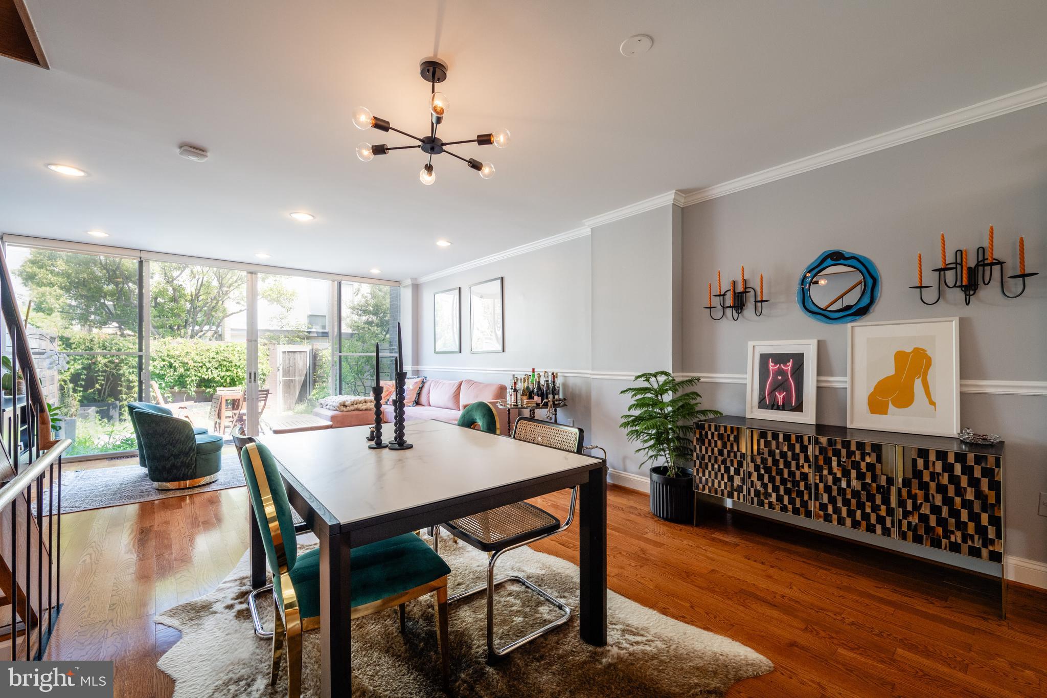 352 N Street Southwest Washington, DC 20024 - Photo 4 of 57 a view of a dining room with furniture window and wooden floor