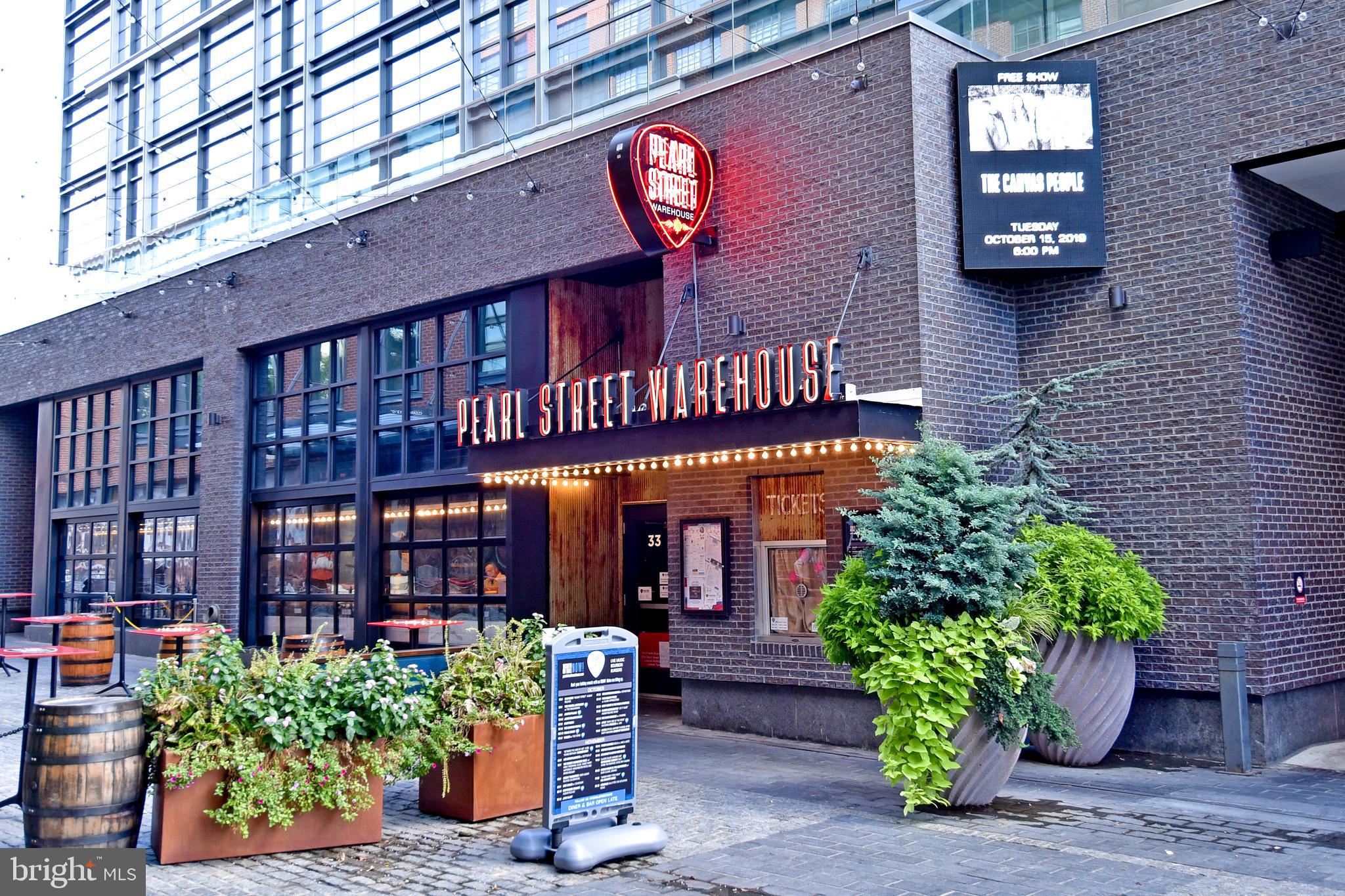 352 N Street Southwest Washington, DC 20024 - Photo 41 of 57 a front view of a building with potted plants