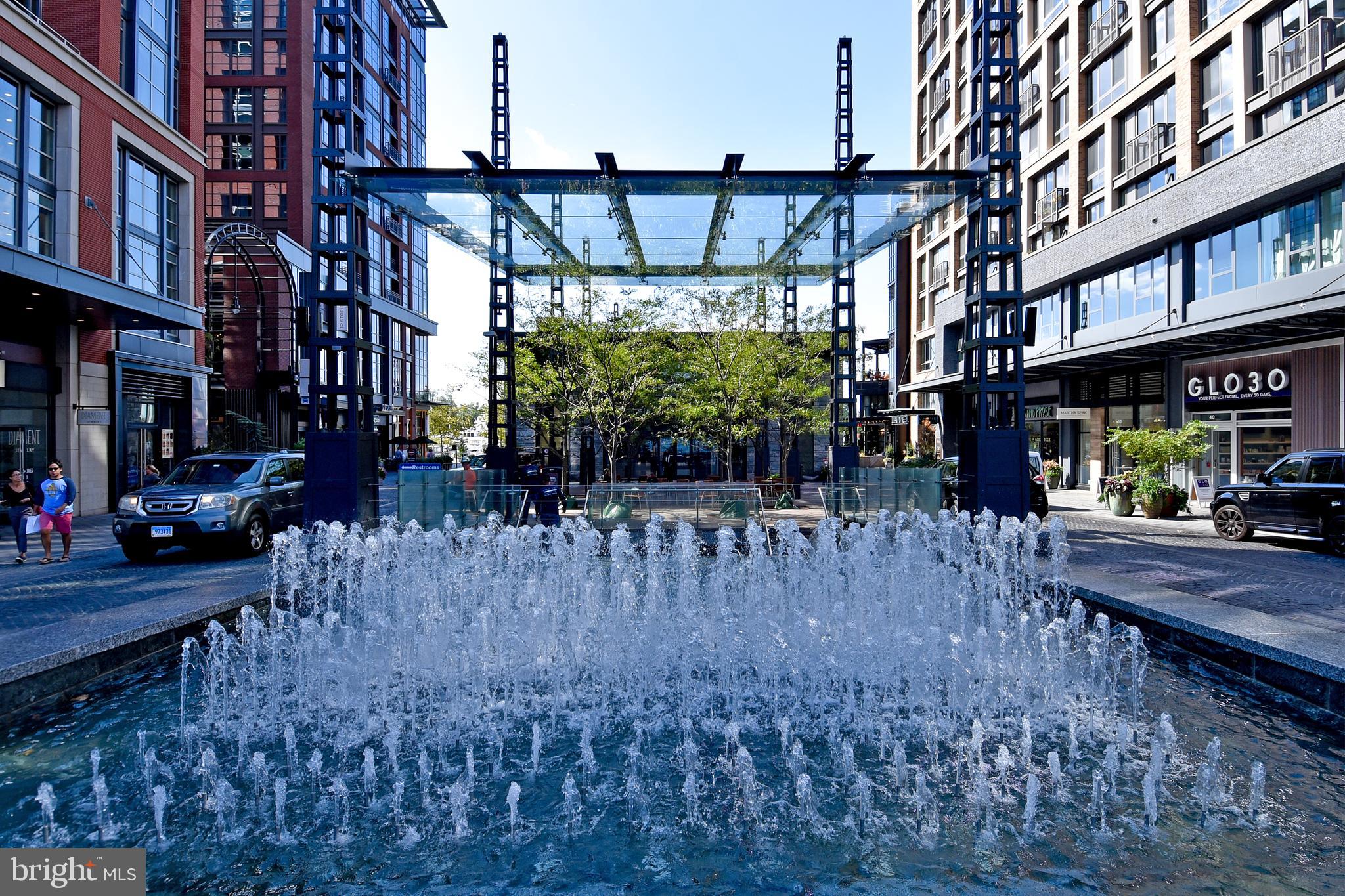 352 N Street Southwest Washington, DC 20024 - Photo 48 of 57 a view of a patio with table and chairs and potted plants