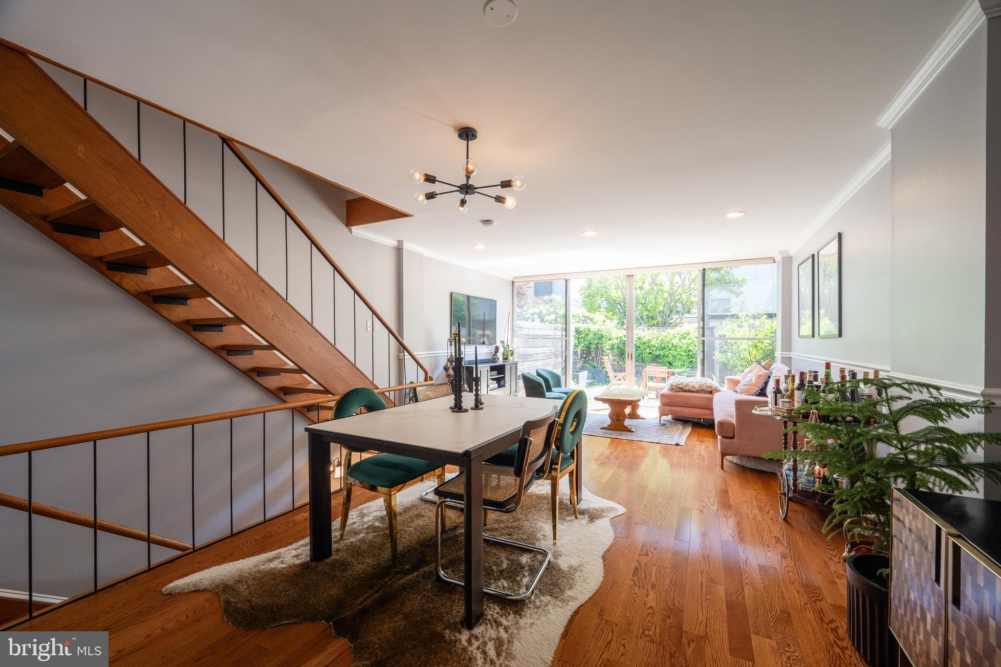 352 N Street Southwest Washington, DC 20024 - Photo 5 of 57 a dining room with furniture window and wooden floor