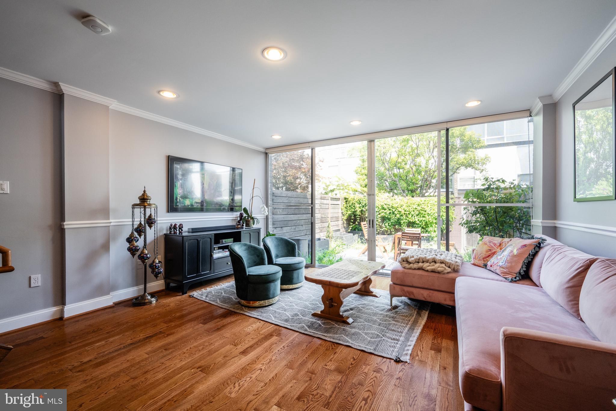 352 N Street Southwest Washington, DC 20024 - Photo 6 of 57 a living room with furniture and a wooden floor