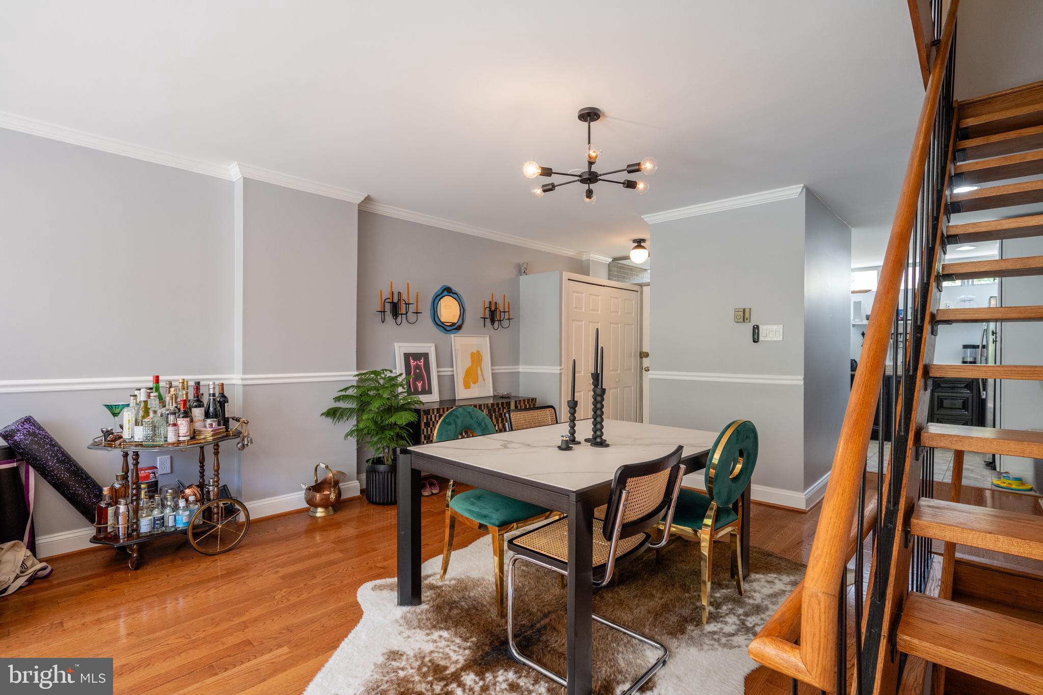 352 N Street Southwest Washington, DC 20024 - Photo 10 of 57 a view of a dining room with furniture and wooden floor