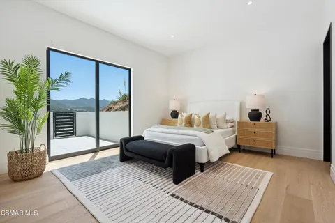 a bathroom with a sink a toilet and a shower