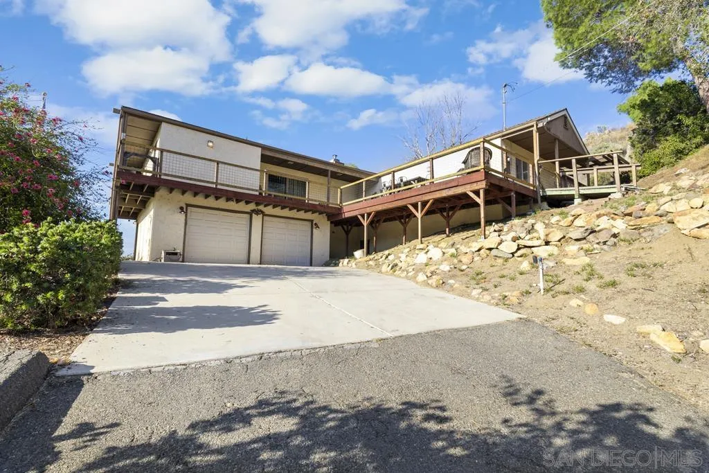 a house with trees in front of it