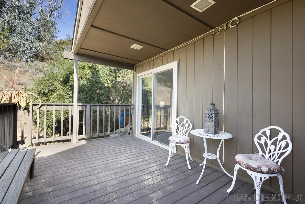 13492 Jamul Drive Jamul, CA 91935 - Photo 22 of 24 a patio with wooden floor and outdoor seating