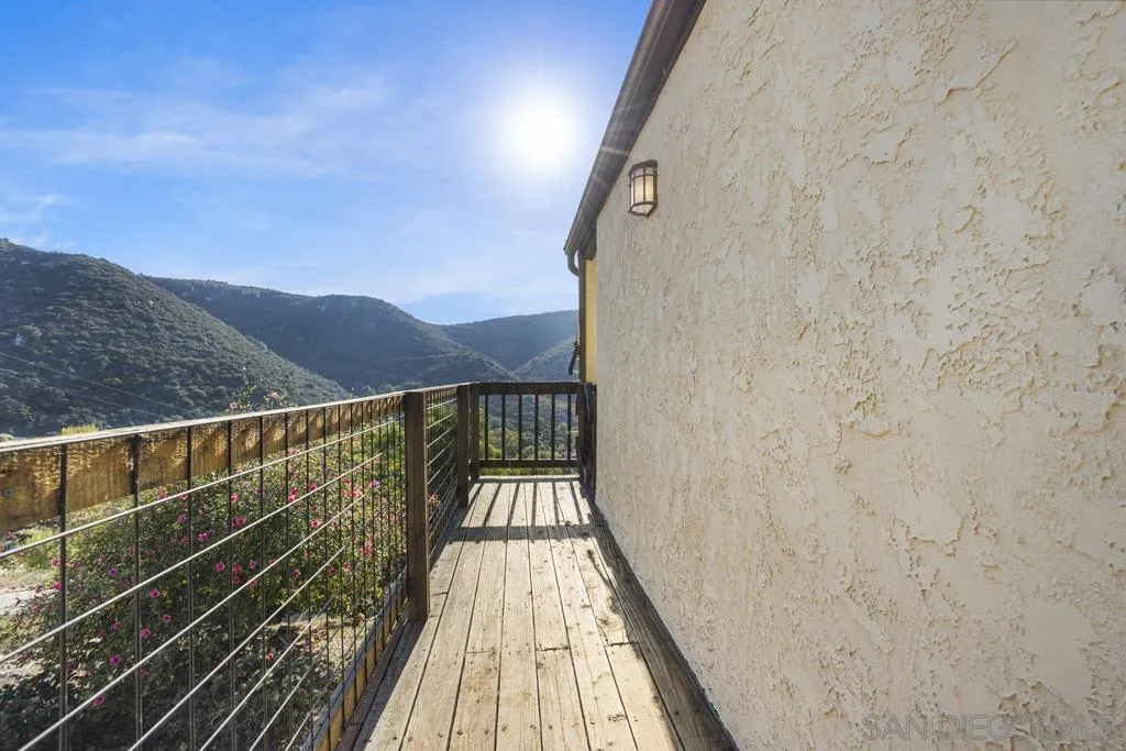13492 Jamul Drive Jamul, CA 91935 - Photo 23 of 24 a view of balcony with wooden floor and mountain view