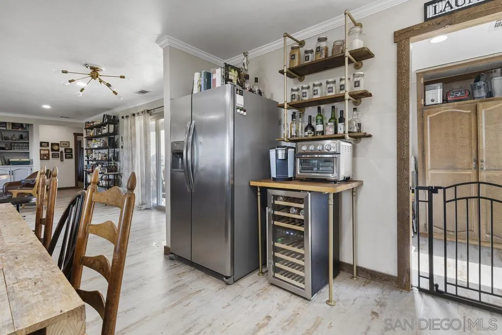 13492 Jamul Drive Jamul, CA 91935 - Photo 7 of 24 a kitchen with stainless steel appliances granite countertop a refrigerator and a stove top oven