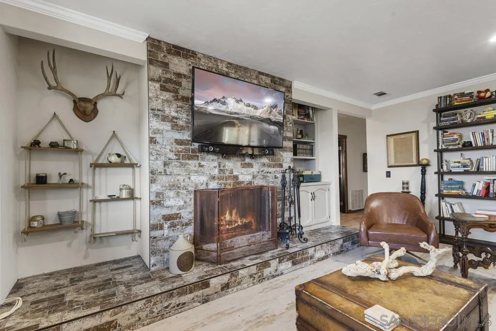 13492 Jamul Drive Jamul, CA 91935 - Photo 9 of 24 a living room with furniture and a fireplace
