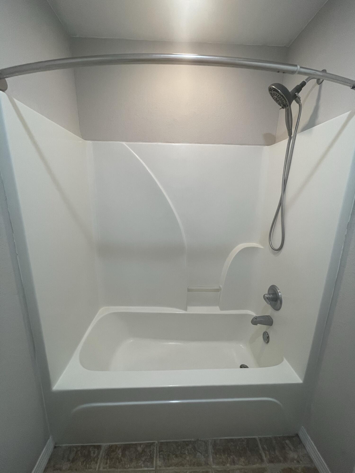 4270 Painter Branch Road Crestview, FL 32539 - Photo 10 of 15 a bathroom with a bathtub