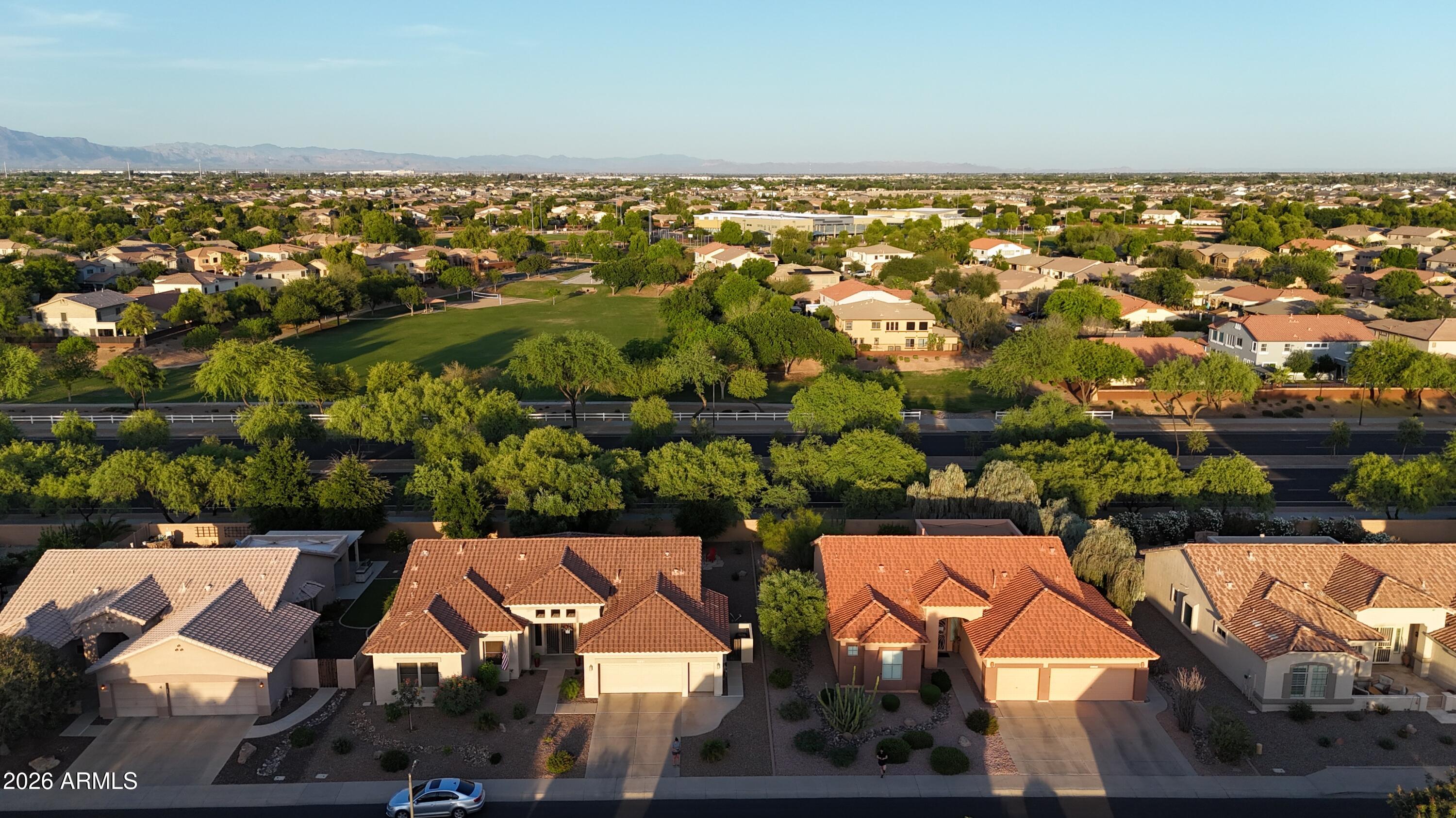 5090 South Ranger Trail Gilbert, AZ 85298 - Photo 39 of 50 an aerial view of residential houses with outdoor space