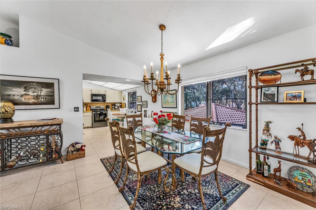 194 Albi Road, Unit 202 Naples, FL 34112 - Photo 11 of 50 Dining area. Excluded from sale is the area carpet and the iron wine rack. Lists of exclusions will be added.
