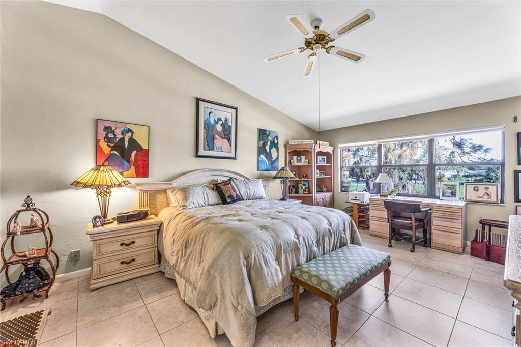 194 Albi Road, Unit 202 Naples, FL 34112 - Photo 21 of 50 Large master bedroom with space for desk area.