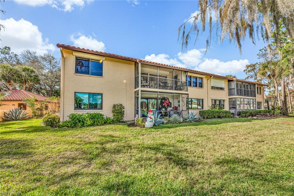 194 Albi Road, Unit 202 Naples, FL 34112 - Photo 30 of 50 Back elevation