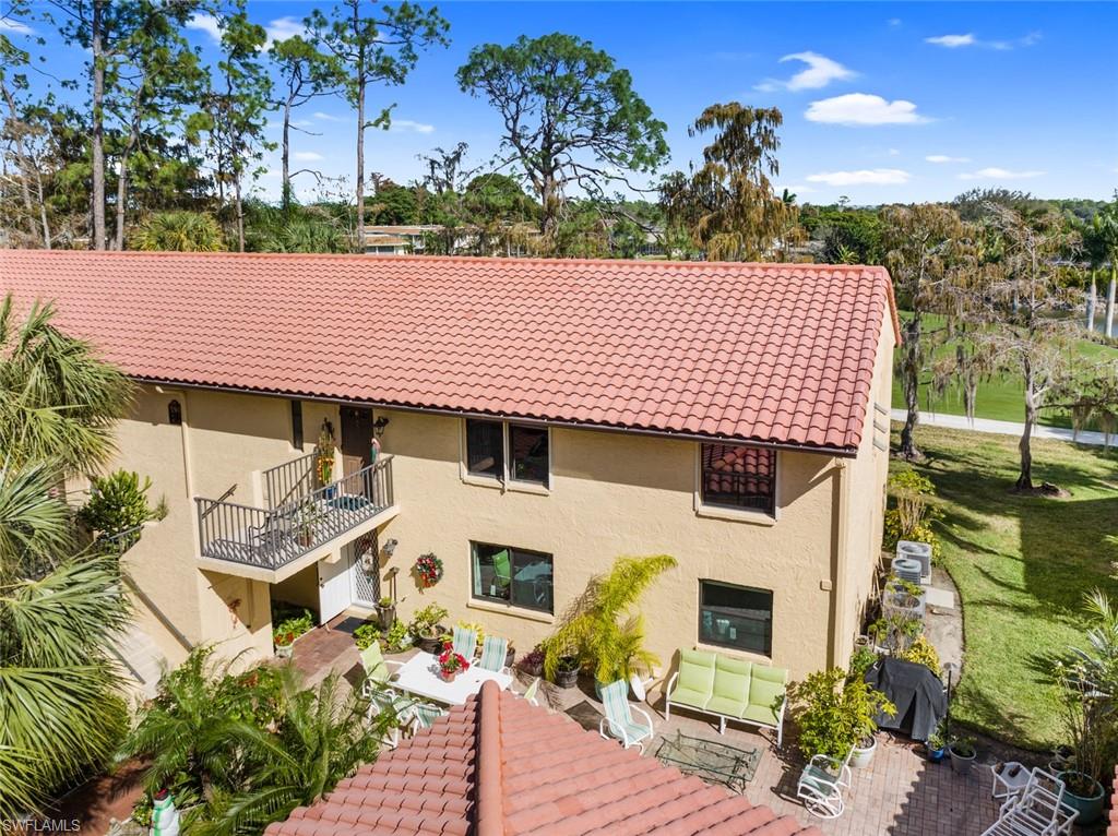 194 Albi Road, Unit 202 Naples, FL 34112 - Photo 34 of 50 Drone view
