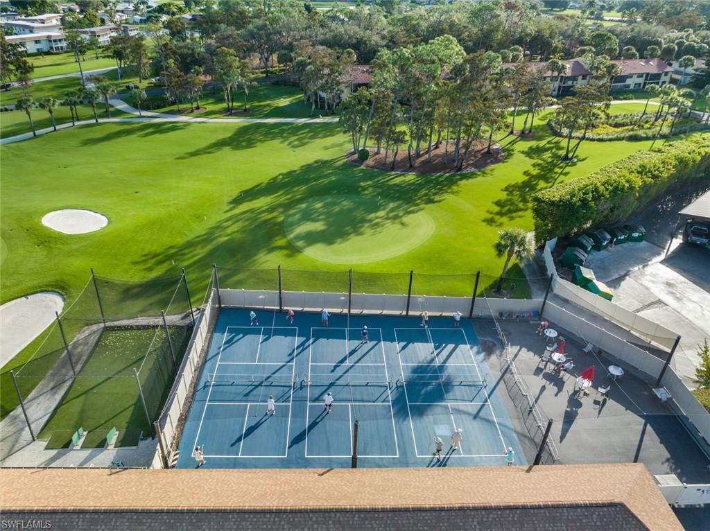 194 Albi Road, Unit 202 Naples, FL 34112 - Photo 46 of 50 More Pickleball courts and view of the 17th green of the Palmetto