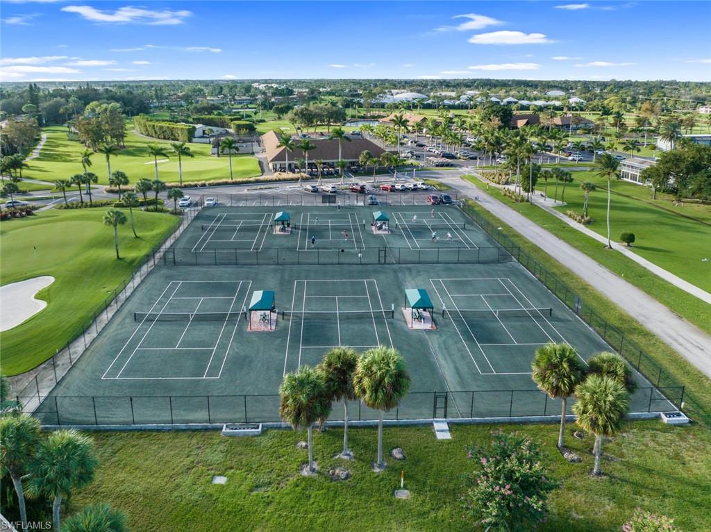 194 Albi Road, Unit 202 Naples, FL 34112 - Photo 47 of 50 New Tennis courts with new Har-Tru surface.